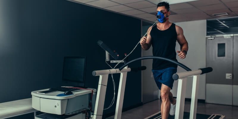 Male on Treadmill with Mask On Face