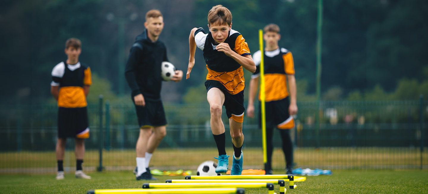 What tends to aggravate injury risk in young athletes?